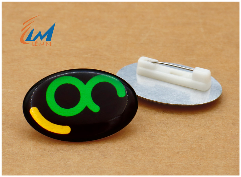 huy hiệu nhôm in uv cắt hình theo yêu cầu