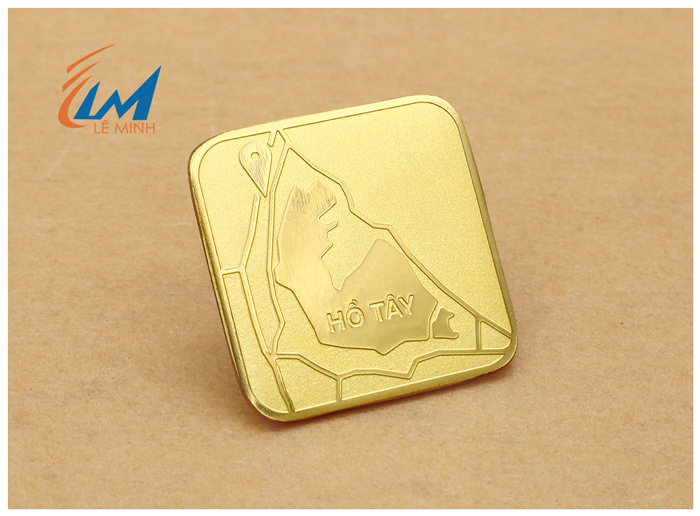 Huy hiệu đồng ăn mòn nổi không xi vàng, không phủ màu