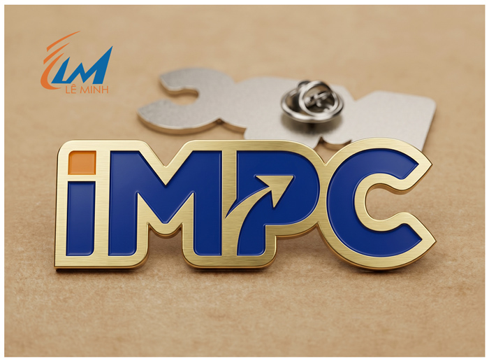 huy hiệu inox vàng xước ăn mòn phủ màu