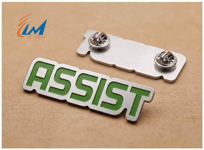 huy hiệu inox bạc xước ăn mòn phủ màu