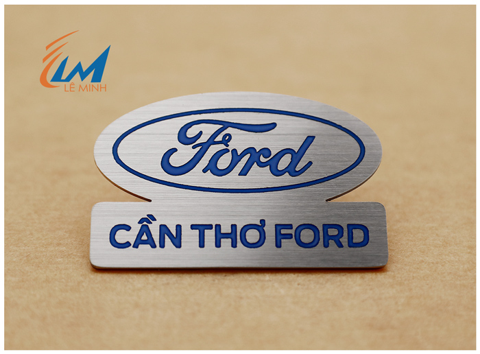 huy hiệu inox ăn mòn phủ màu theo yêu cầu