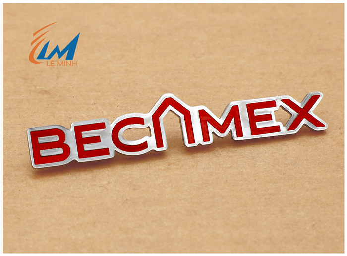 huy hiệu inox ăn mòn phủ màu theo yêu cầu