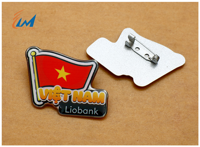 Huy hiệu inox in uv biên dạng theo yêu cầu