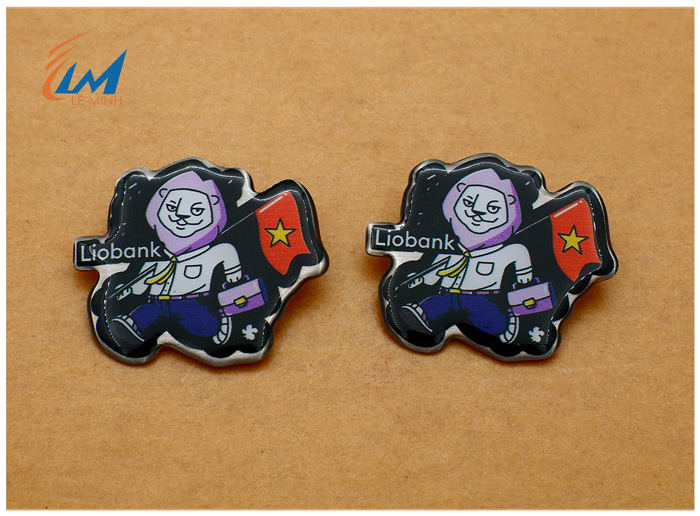 huy hiệu đeo áo inox in theo yêu cầu