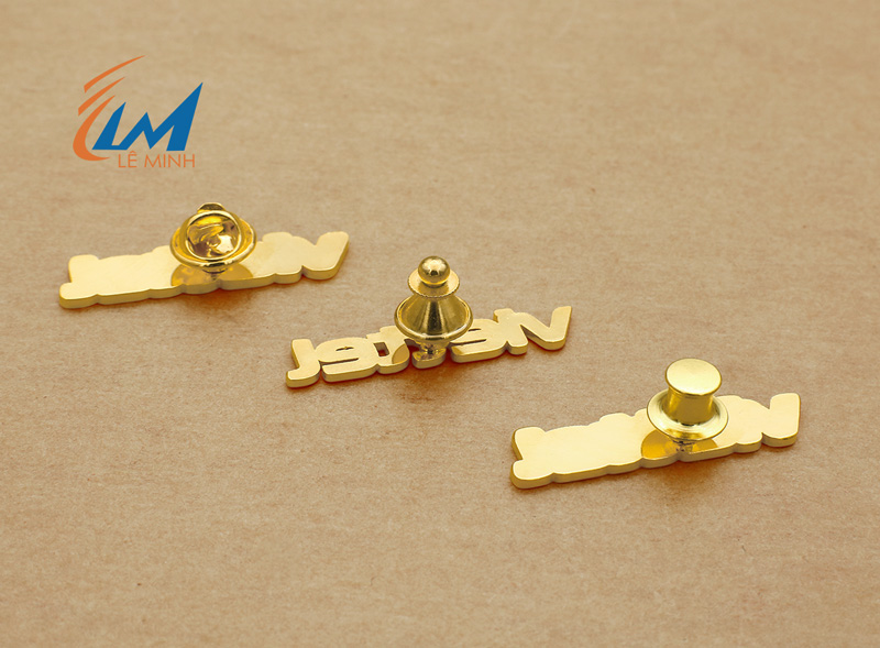 Huy hiệu đồng xi vàng xi bạc phủ màu